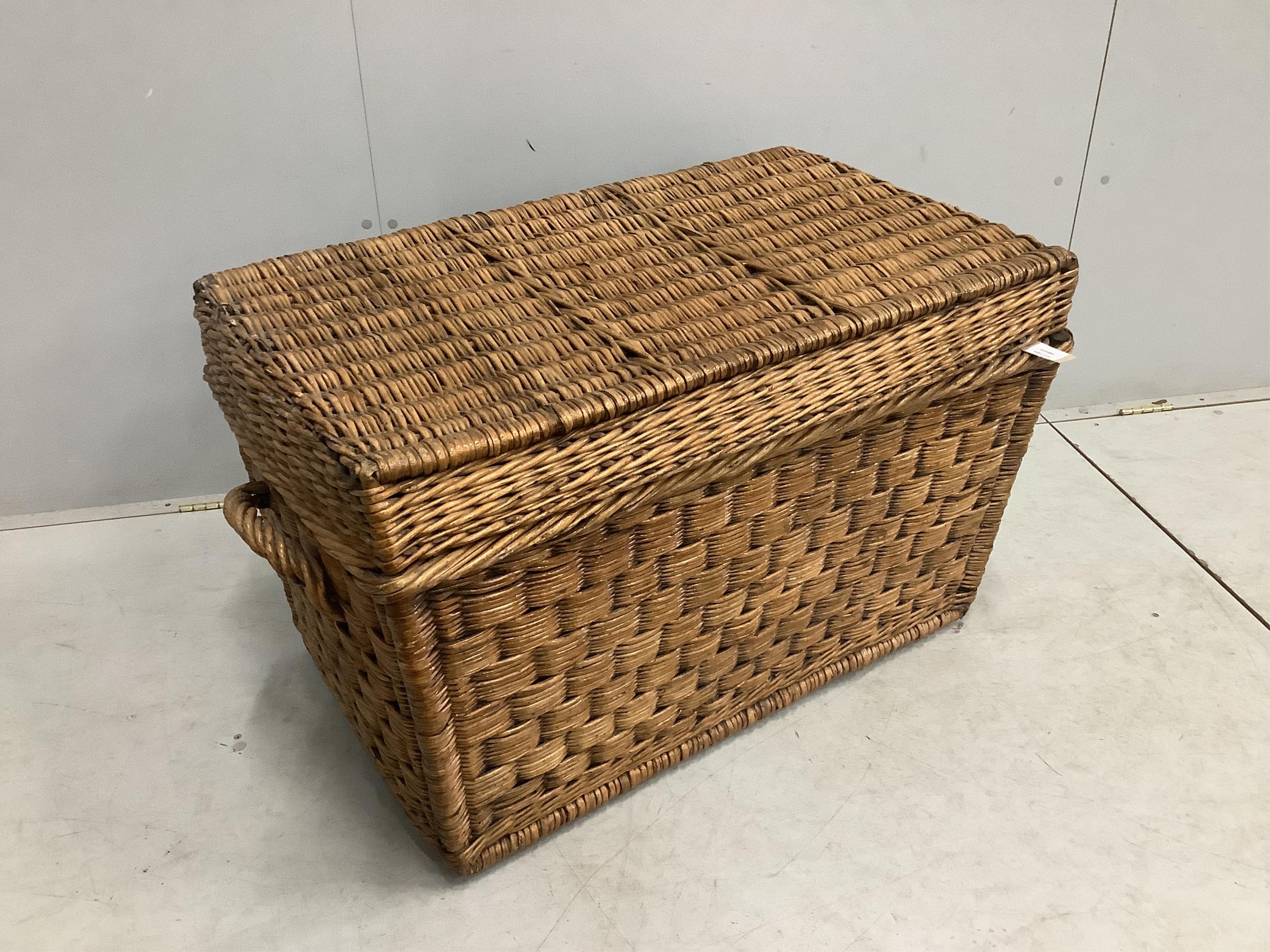 A vintage wicker laundry basket, width 93cm, depth 58cm, height 58cm. Condition - fair